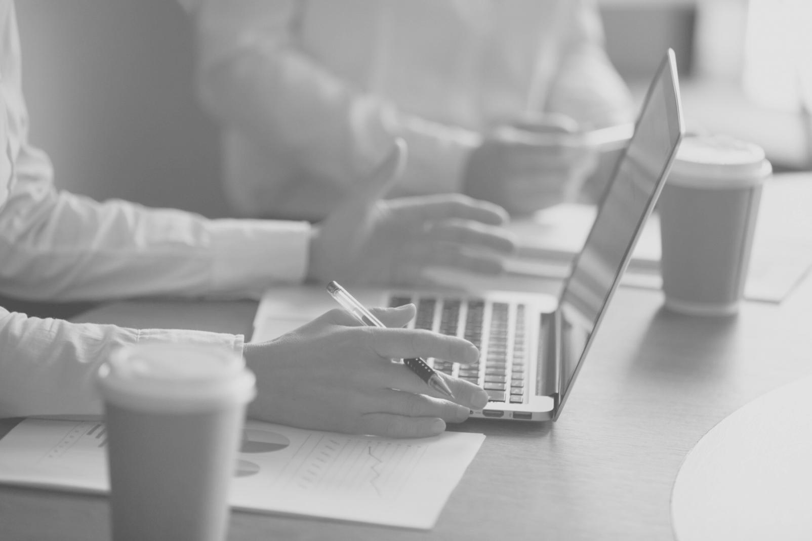 Collaborative cybersecurity team working on financial data protection strategies